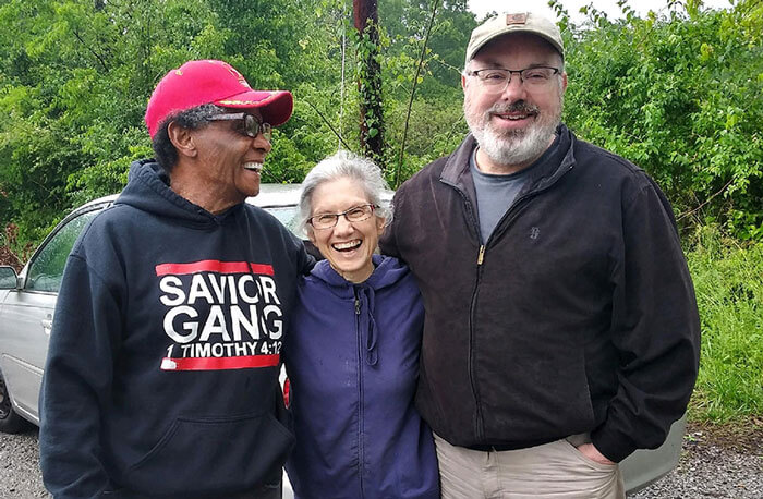 A person sitting on a city street